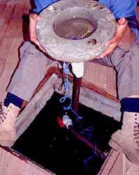 Integrated siphon starting funnel, bottom inlet/ filter on below grade rain water storage.