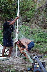 Attempting to jet a tube well.