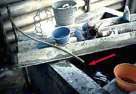 Open water-storage tank with lavadero.