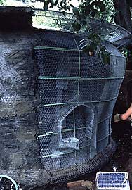 Ferro cement rain water cistern under construction, showing expanded metal lath and epoxy-coated rebar.